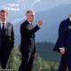 French President Emmanuel Macron, left to right, Prime Minister Mark Carney and U.S. President Donald Trump