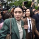 Thailand's Prime Minister Paetongtarn Shinawatra walks through Government House after a cabinet meeting in Bangkok on July 1, 2025.